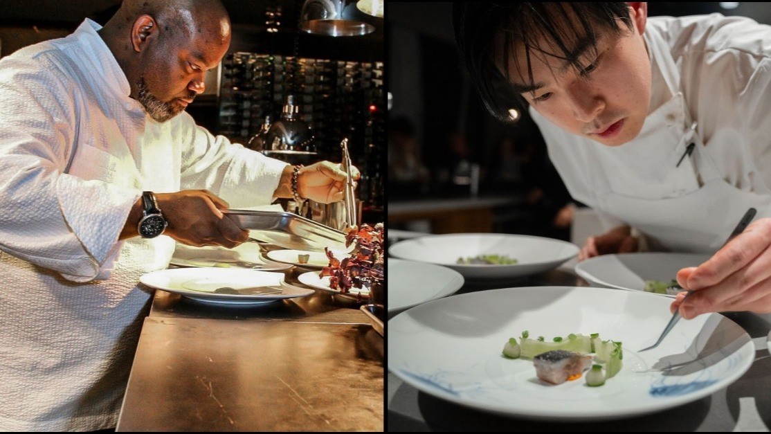 The image shows two chefs plating food at a restaurant, carefully garnishing dishes on white plates.