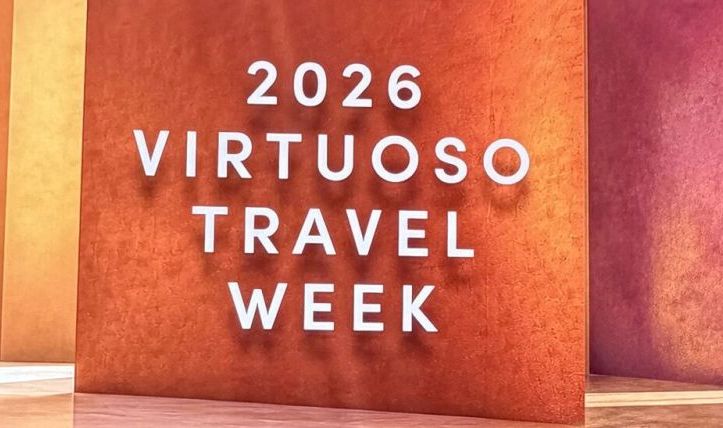 A sign reads “2026 Virtuoso Travel Week”.
