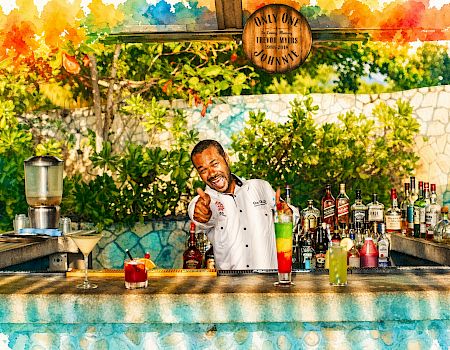 A smiling bartender/chef poses poolside behind shelves of colorful liquor bottles and cocktails, with a memorial plaque reading “Only One.”